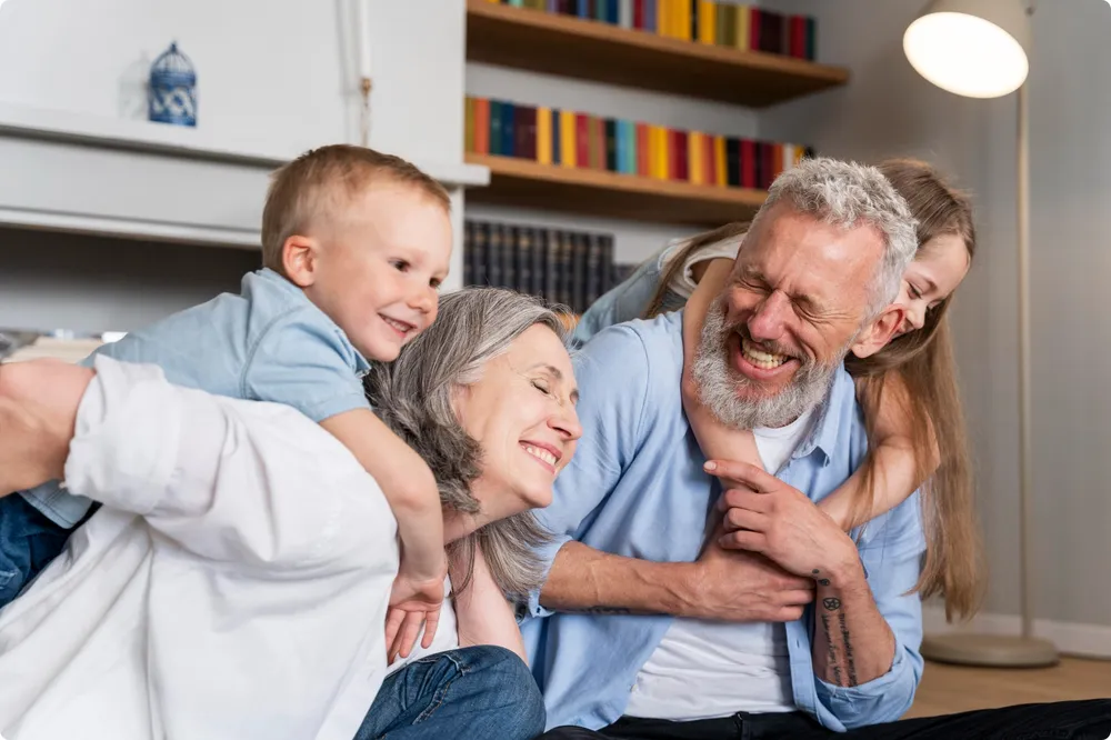 Grandparents playing with their grandkids 