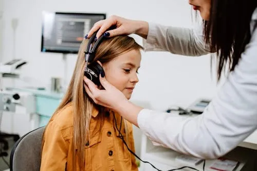 Using Headphones with Hearing Aids: Compatibility & Tips