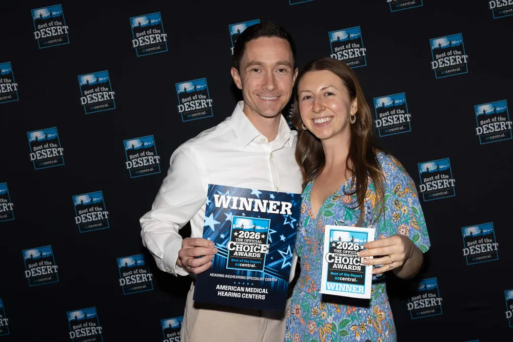 American Medical Hearing Centers representatives holding the 2026 Best of the Desert winner plaque at the Phoenix awards gala